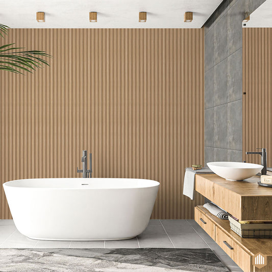 Salle de bain moderne comprenant un mur en lattes de bois Acoupanel™ Panneau Tasseau Hydrofuge effet Chêne Naturel, une baignoire blanche autoportante, un meuble-lavabo flottant en bois avec des vasques, des accents de carrelage gris et un décor minimaliste.