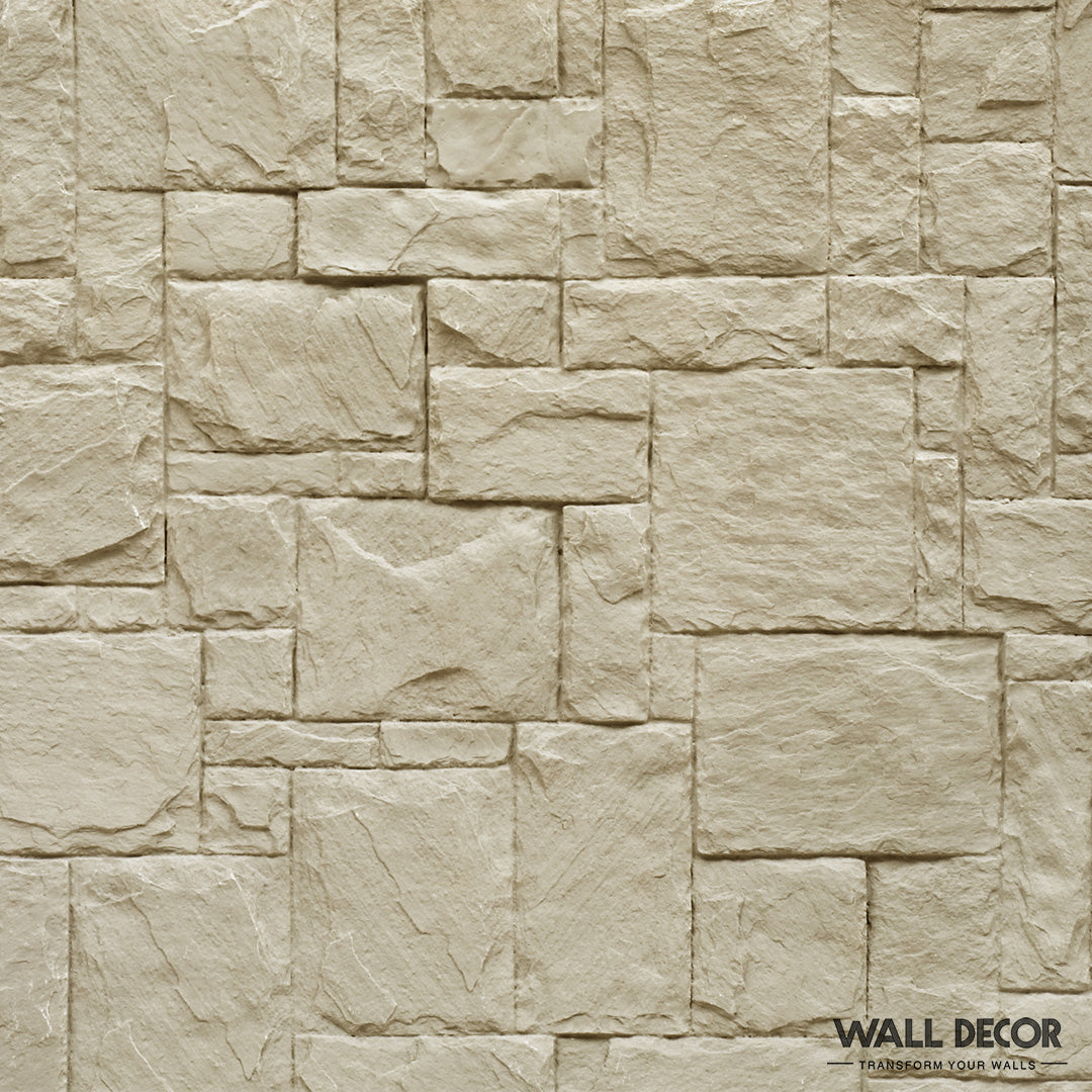 Gros plan d'un mur de pierre beige avec des pierres rectangulaires et carrées dans un motif géométrique et une texture naturelle. Echantillons Plaque Covering Panels : Choisissez votre Design ! by Covering Panels™ apparaît dans le coin inférieur droit.