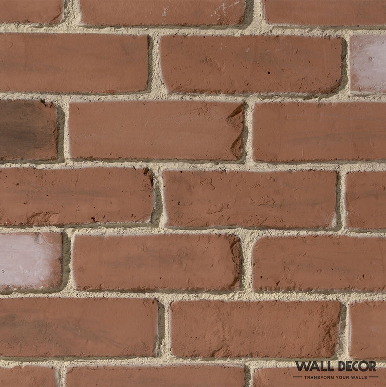Une vue rapprochée de Parement Brique Rouge - English Brick par Panespol™, montrant des briques rouges avec un mortier de couleur claire et de subtiles variations de couleur entre certaines briques.