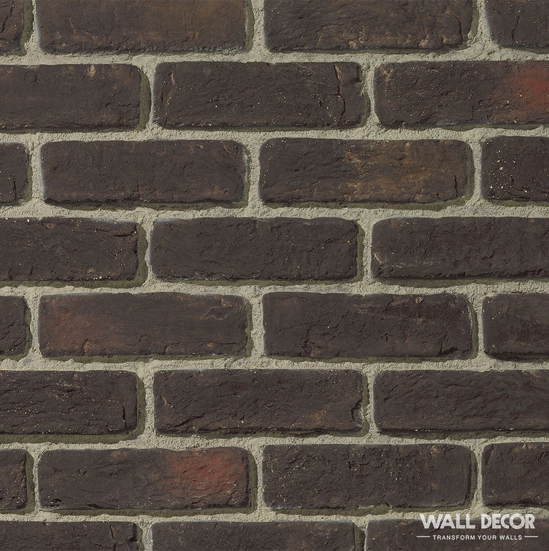 Vue rapprochée d'un mur Échantillon Parement brique Panespol™ brun foncé, présentant un mortier gris clair entre les briques. Choisissez votre design avec cet échantillon de placage brique de qualité de Panespol™ !.