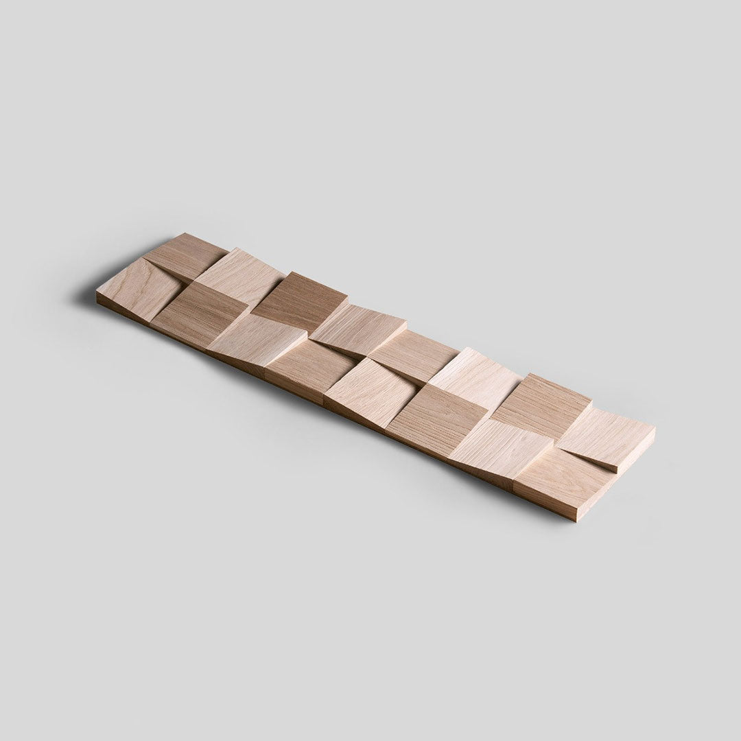 L'Échantillon Parement Bois de Wood & Wall Decor™ présente des carreaux carrés surélevés et inclinés dans des tons marron clair pour un effet géométrique 3D saisissant - parfait pour ajouter une touche moderne à votre espace. Choisissez votre design !.