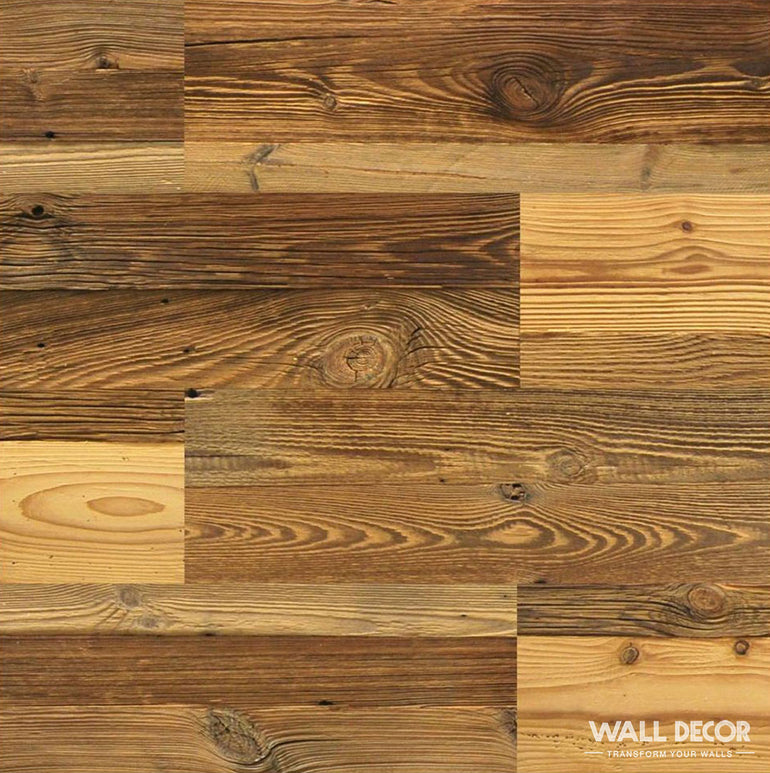 Un gros plan de Parement Bois Chalet Alpine (0,5 m²) de Wood & Wall Decor™ montre des panneaux de grain de bois brun naturel dans un motif chaud et en quinconce - parfait pour une mise en valeur élégante des murs.