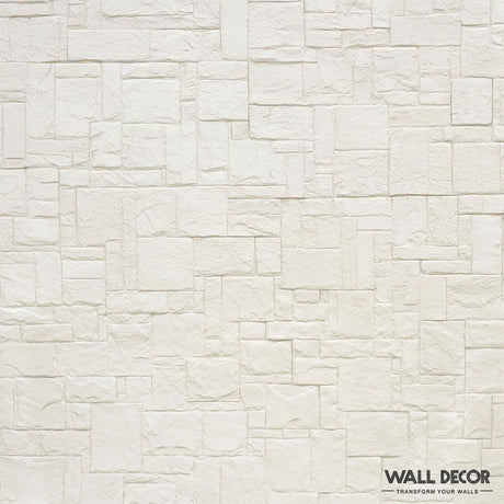 Un mur de briques blanches texturées dans un motif rectangulaire irrégulier, présentant Plaque Pierre Blanche - Style Travertin (2,85m x 1,3m : 3,7 m²) par Covering Panels™. Le logo et le slogan "Transform Your Walls" se trouvent dans le coin inférieur droit.
