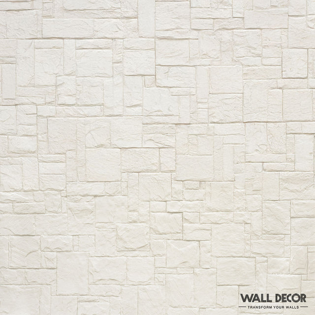 Un mur de briques blanches texturées dans un motif rectangulaire irrégulier, présentant Plaque Pierre Blanche - Style Travertin (2,85m x 1,3m : 3,7 m²) par Covering Panels™. Le logo et le slogan "Transform Your Walls" se trouvent dans le coin inférieur droit.