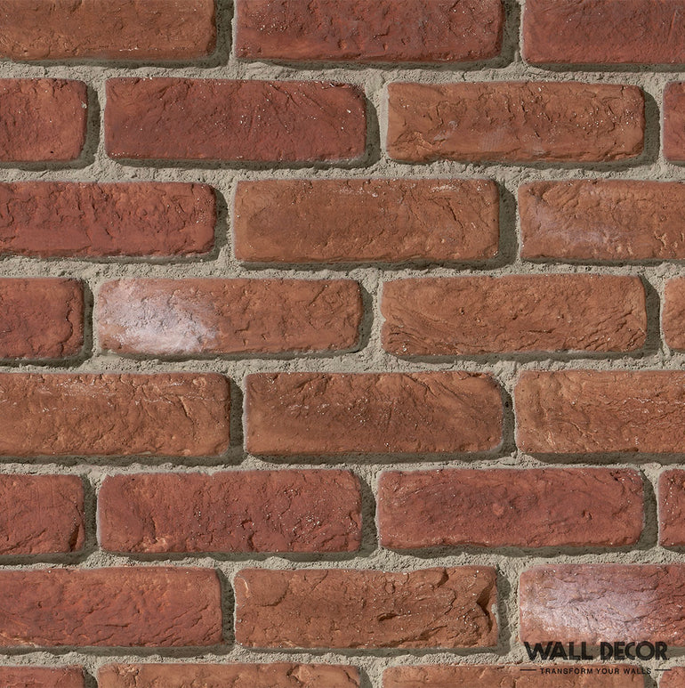 Un gros plan de Parement Brique rouge - Urban Brick de Panespol™ montre la texture de la brique rouge et les lignes de mortier visibles, parfait comme arrière-plan ou pour ajouter du style à la table. La mention 