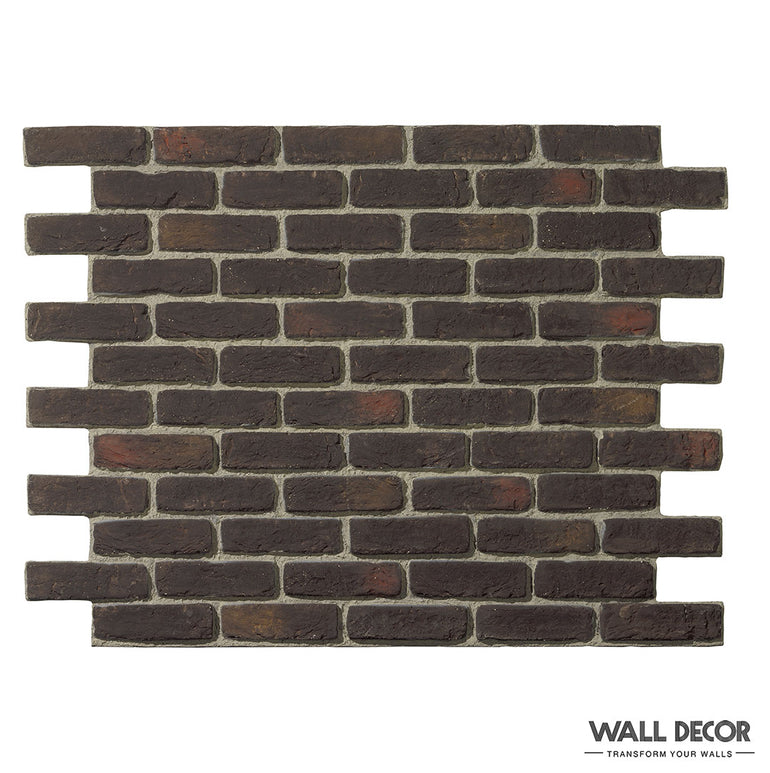 Un panneau rectangulaire, Parement Brique vieilli Cassel - Urban Brick de Panespol™, présente de fausses briques marron foncé avec des bords décalés, imitant les vraies briques.