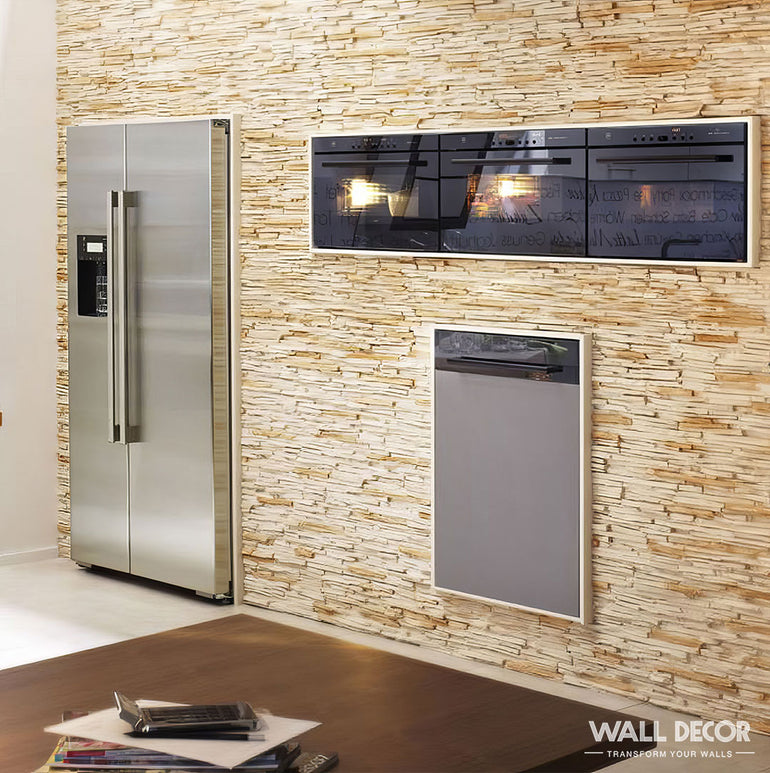 Une cuisine moderne présente un réfrigérateur en acier inoxydable, un four encastré et un lave-vaisselle placés contre un mur d'accent Parement Pierre beige - Laja Fina de Panespol™. L'image affiche la marque WALL DECOR dans le coin inférieur droit.